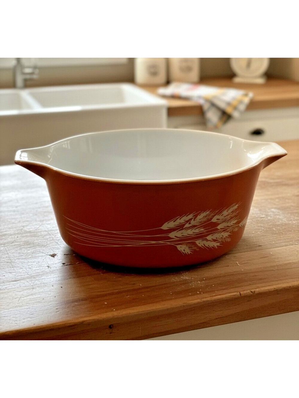 Vintage Pyrex 2.5-quart Cinderella casserole dish in the classic Autumn Harvest